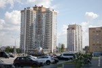 «Квартиры тут покупали айтишники из России». Как живется в высотках у бывшего Червенского рынка