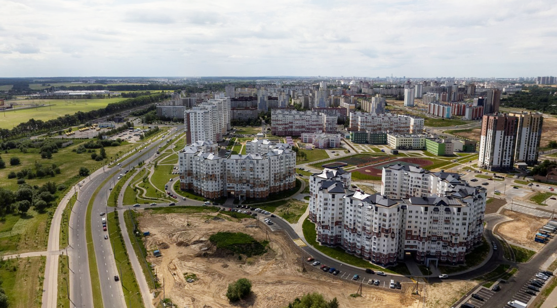 Эти минские дома похожи на улиток. А почем тут продают квартиры?