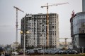 Уже вставляют окна. Посмотрели, как в Минске строят ЖК «Гулливер»